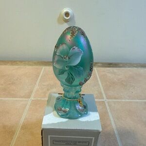 Fenton Iridescent Teal Glass Egg with White Floral Motif and Gold Accents